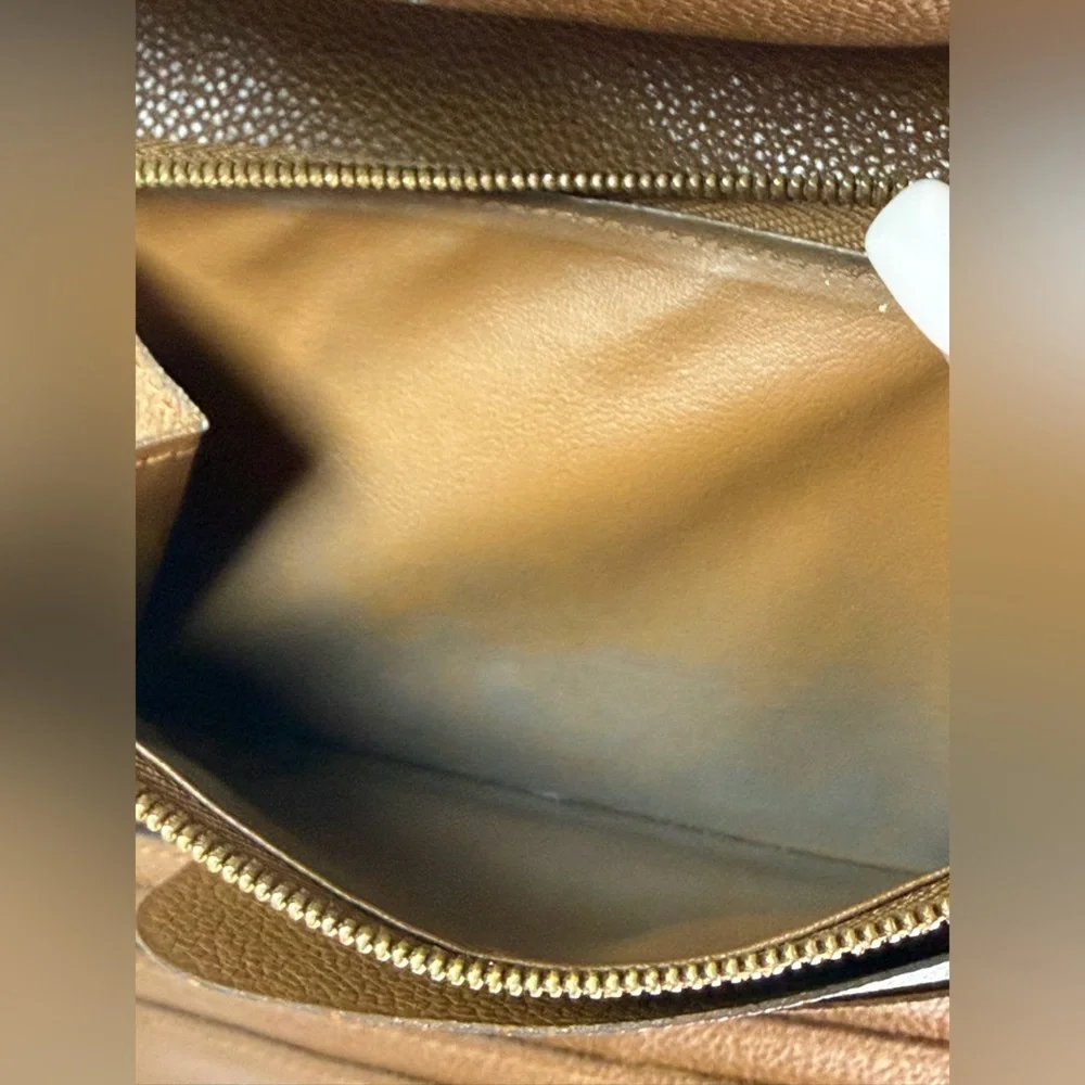 Louis Vuitton Virtuose Wallet Crafted Brown Monogram Empreinte Leather